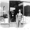 Lee Cooper standing in front of the business he founded.